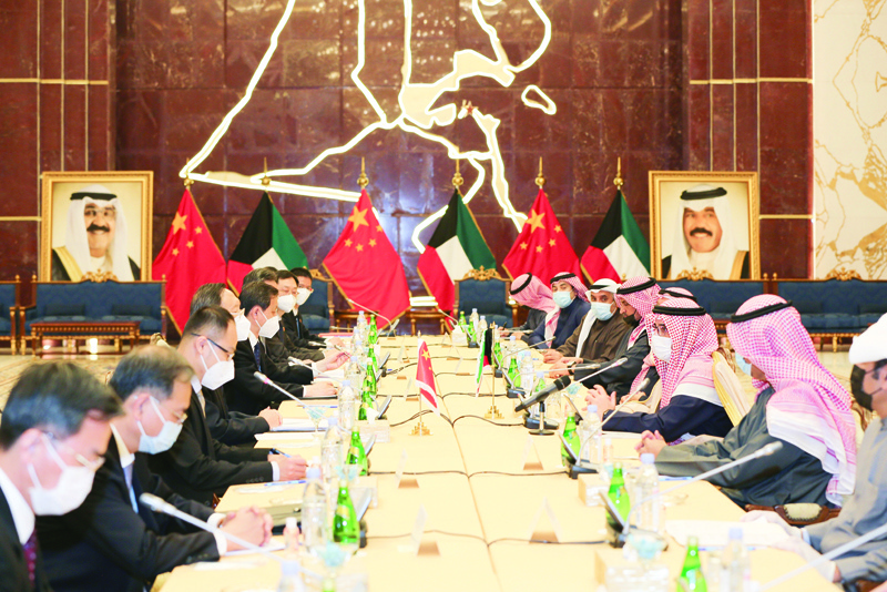 KUWAIT: Foreign Minister Sheikh Dr Ahmad Nasser Al-Mohammad Al-Sabah and Director of the Chinese Central Foreign Affairs Commission Office Yang Jiechi chair their respective countries' delegations during the meeting. - KUNAn