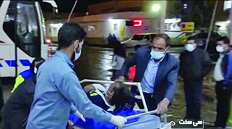 Sisakht, Iran: An image grab from footage obtained from Iranian State TV IRIB yesterday shows medics transporting an injured man on a stretcher following a 5.4 magnitude earthquake near the town of Sisakht. -AFP n