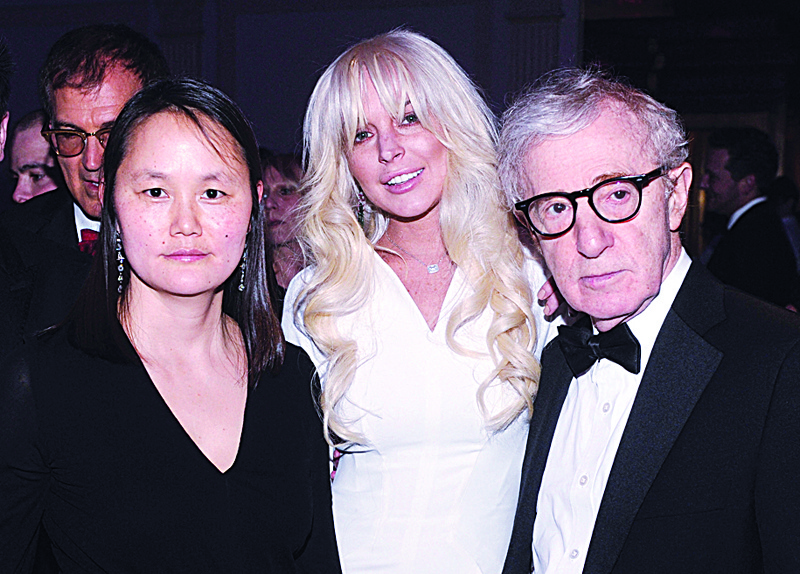 In this file photo (from left) Soon-Yi Previn, Lindsay Lohan, and Woody Allen attend the amfAR New York Gala To Kick Off Fall 2012 Fashion Week at Cipriani Wall Street in New York City.-AFP photosn
