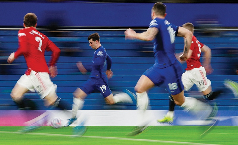 LONDON: Chelsea's English midfielder Mason Mount (center) runs with the ball during the English Premier League football match between Chelsea and Manchester United at Stamford Bridge yesterday. - AFP 