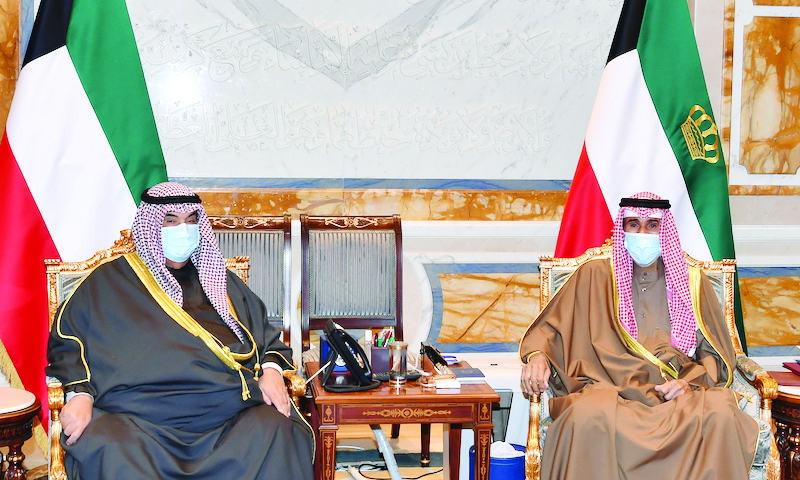 KUWAIT: His Highness the Amir Sheikh Nawaf Al-Ahmad Al-Jaber Al-Sabah meets His Highness Sheikh Nasser Al-Mohammad Al-Ahmad Al-Sabah. - Amiri Diwan and KUNA photosn