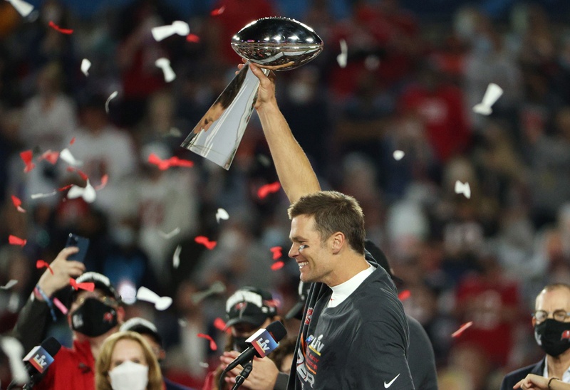 TAMPA: Tom Brady of the Tampa Bay Buccaneers hoists the Vince Lombardi Trophy after winning Super Bowl LV at Raymond James Stadium on Sunday in Tampa, Florida. – AFPn