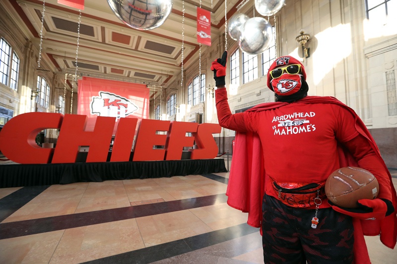 KANSAS CITY: Michael Wheeler, also know as KC Superman, poses in front of a Kansas City Chiefs display at Union Station in downtown Kansas City ahead of Super Bowl LV against the Tampa Bay Buccaneers on Monday in Kansas City, Missouri. – AFPn