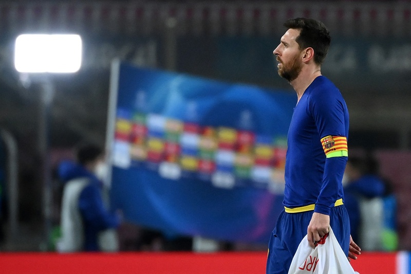 BARCELONA: Barcelona's Argentinian forward Lionel Messi walks off the pitch at the end of the UEFA Champions League round of 16 first leg football match between FC Barcelona and Paris Saint-Germain FC at the Camp Nou stadium in Barcelona on Tuesday. – AFPn