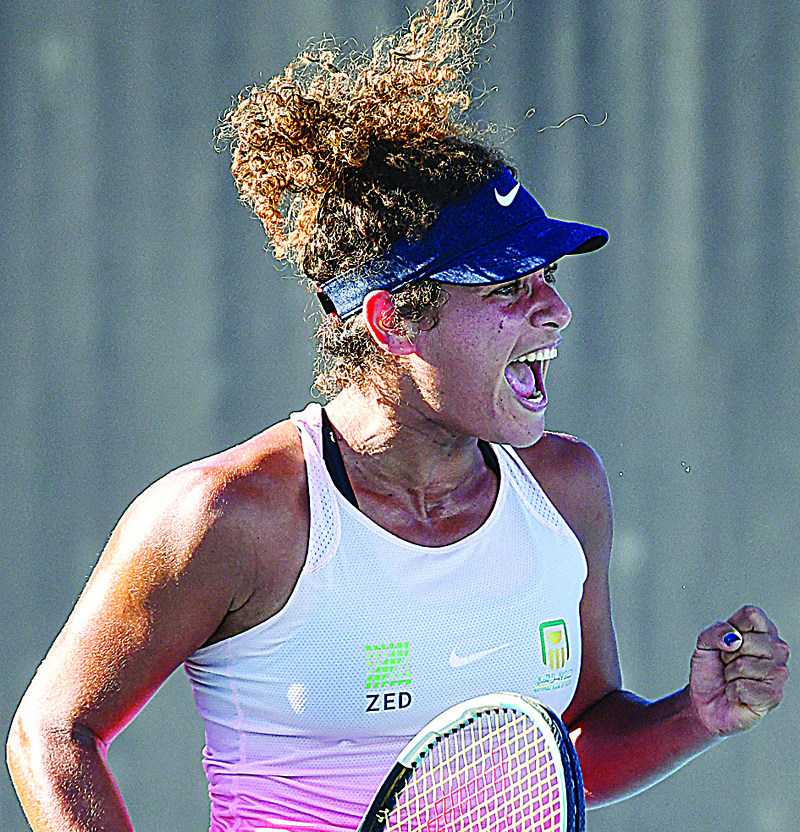 MELBOURNE: Egypt's Mayar Sherif celebrates beating France's Chloe Paquet in their women's singles match on day two of the Australian Open tennis tournament in Melbourne on Tuesday. - AFPn