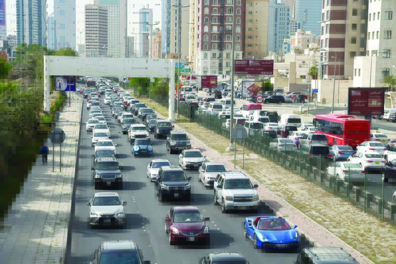 KUWAIT: Kuwait suffered massive traffic jams and chaos this week as motorists rush to return home before the daily curfew kicks in. - File photo by Fouad Al-Shaikhn