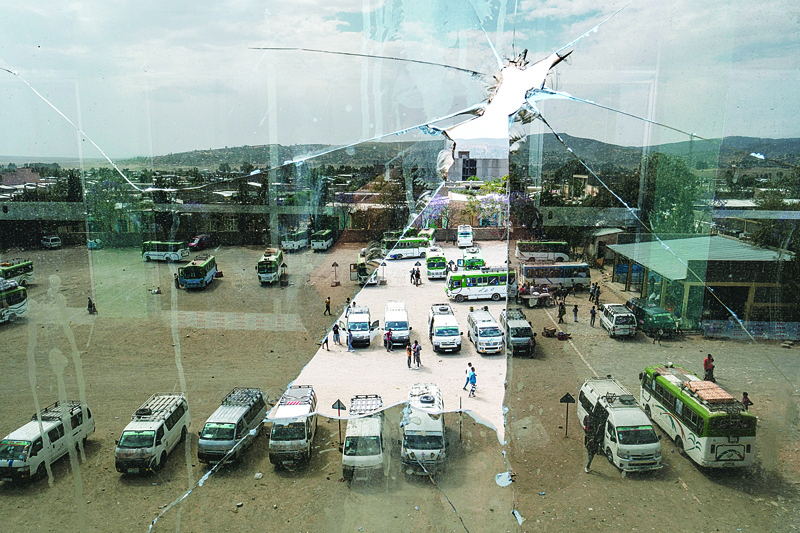 MEKELE: A general view, through a broken glass, of a bus station in Wukro, north of Mekele. Every phase of the four-month-old conflict in Tigray has brought suffering to Wukro, a fast-growing transport hub once best-known for its religious and archaeological sites. - AFPn