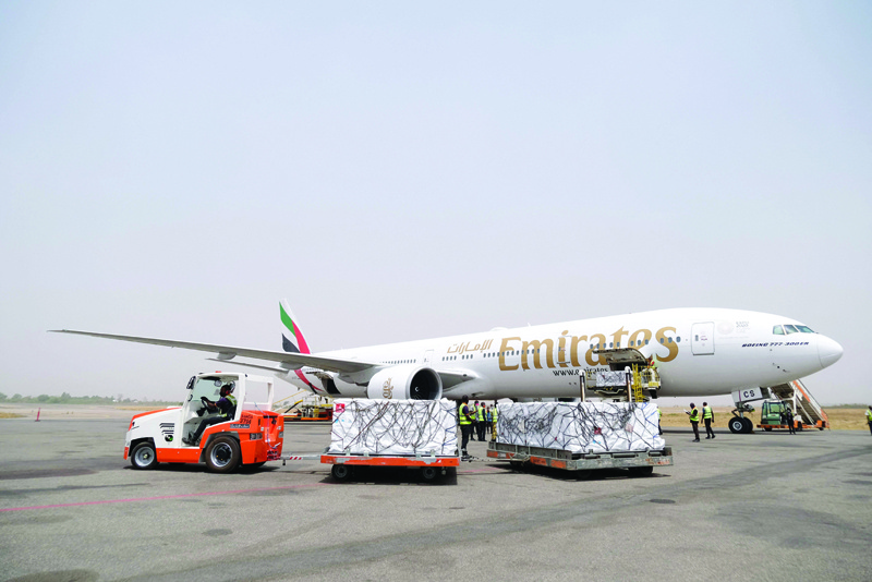 ABUJA: The first batch of Oxford/AstraZenica COVID-19 vaccine doses are offloaded from a plane during its arrival at the Nnamdi Azikwe International Airport, in Abuja.-AFP nn