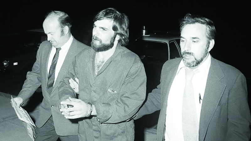 In this Nov 15, 1974 file photo, Ronald DeFeo Jr, center, leaves Suffolk County district court after a hearing, on New York's Long Island.n