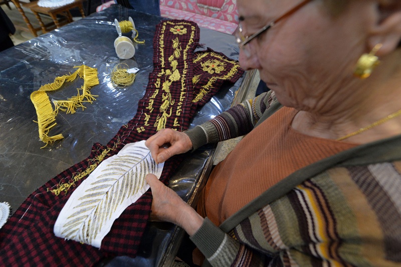 Photos show Iraqi Christian Karjiya Baqtar embroiders a precious prayer shawl using golden thread, to gift to Pope Francis during his upcoming visit to her Iraqi hometown Qaraqosh.—AFP photosn