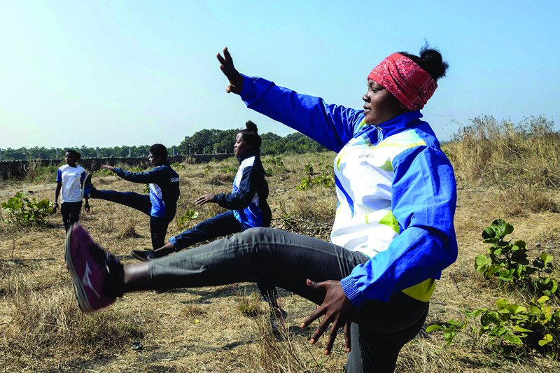 Shenaz Lobi (right), along with other members of the Siddi community, taking part in an exercise routine during an athletes program.n