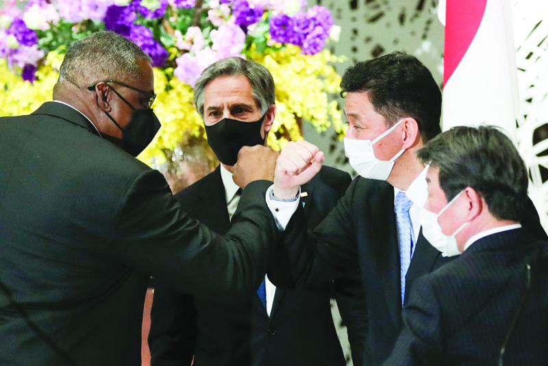 TOKYO: US Secretary of State Antony Blinken and Defense Secretary Lloyd Austin leave after their joint press conference with Japan's Foreign Minister Toshimitsu Motegi and Defense Minister Nobuo Kishi after their 2+2 meeting at Iikura Guest House in Tokyo yesterday.-AFPn