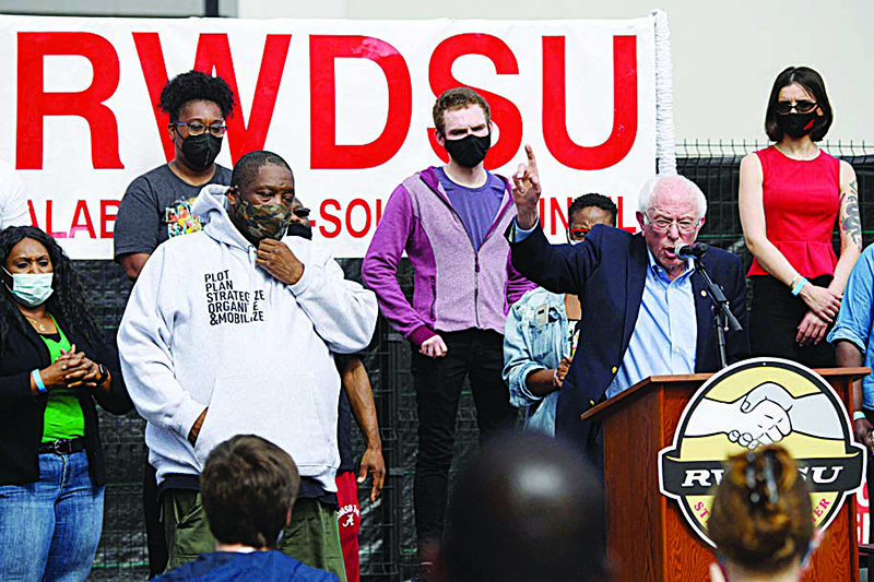 BIRMINGHAM, Alabama: Senator Bernie Sanders and Rapper Michael “Killer Mike” Render (left) speak in support of the unionization of Amazon.com, Inc. fulfillment center workers outside the Retail, Wholesale and Department Store Union (RWDSU) on Friday. —AFP