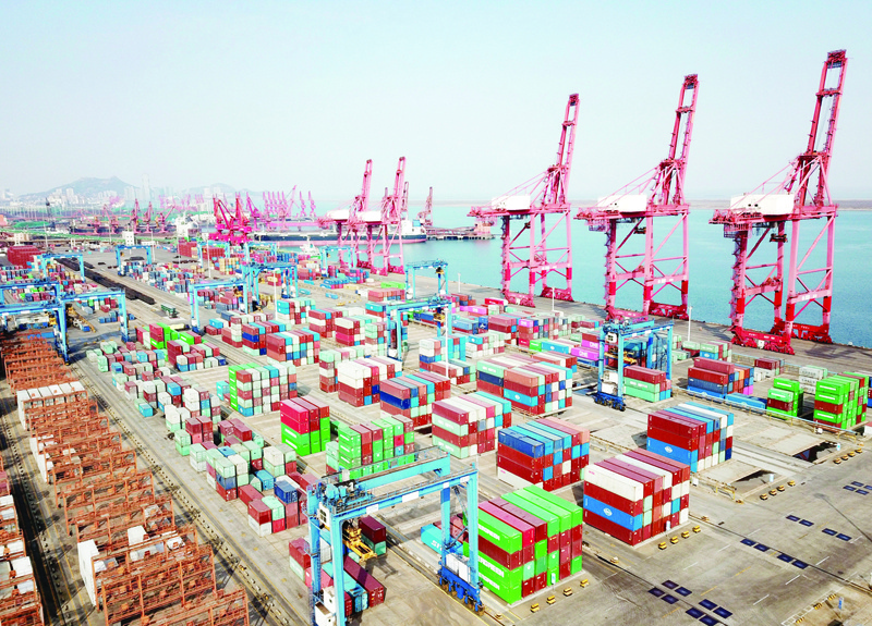 This aerial photo shows shipping containers for export stacked at a port in Lianyungang, in China's eastern Jiangsu province on March 7, 2021, as the country's export growth jumped to the highest in over two decades according to official data shown on March 7.nSTR / AFPn