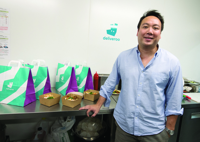 PARIS: In this file photo, co-founder and CEO of Deliveroo, Will Shu, poses during the launch of first kitchen Deliveroo Editions in Saint-Ouen, outside Paris. - AFPn