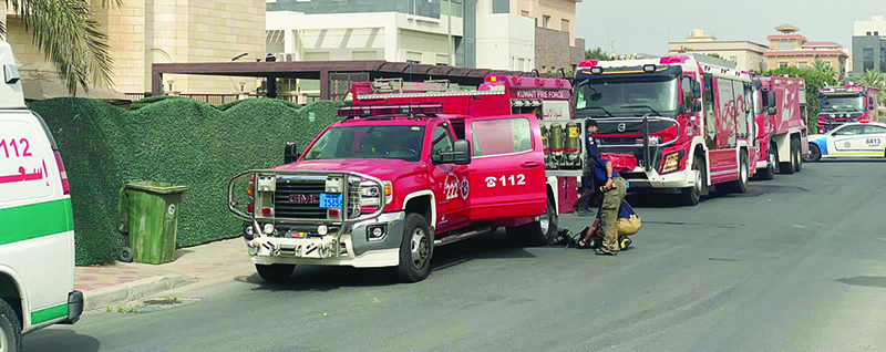 KUWAIT: Fire engines parked outside a Bayan house where a fire was reported Friday morning.