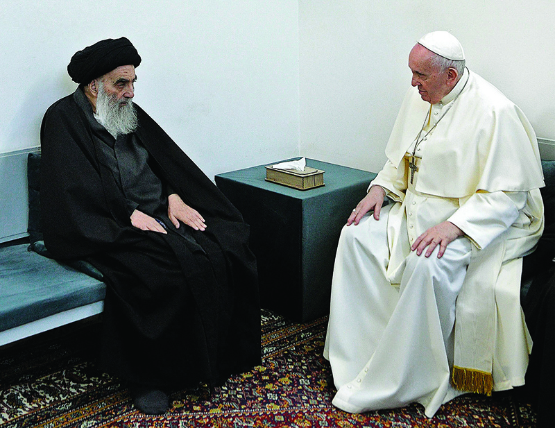 NAJAF: Pope Francis meets top Shiite cleric Grand Ayatollah Ali Al-Sistani in this Iraqi shine city yesterday. - AFP n