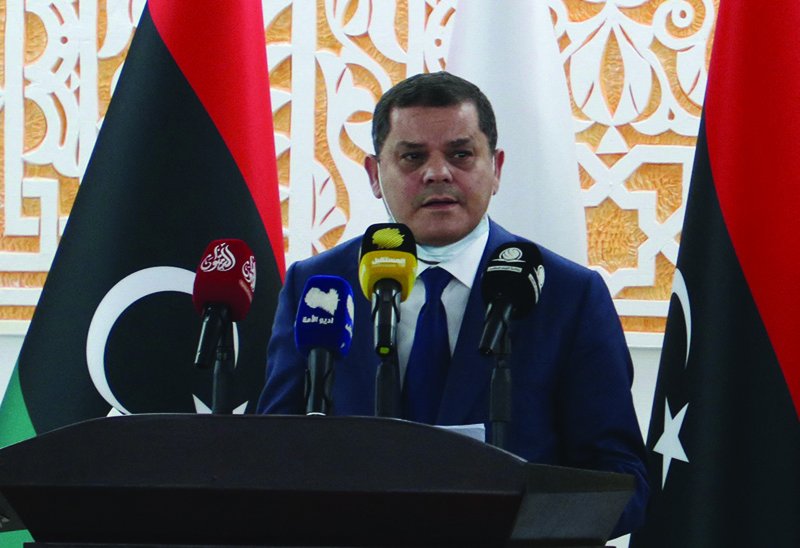 TOBRUK: Libya's new interim Prime Minister Abdul Hamid Dbeibah speaks after being sworn in yesterday. - AFP  n