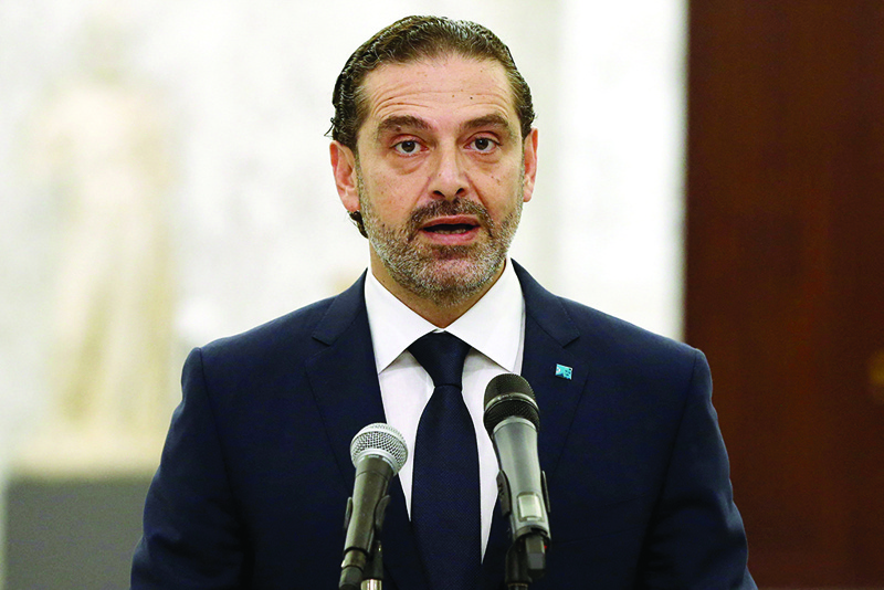 BAABDA, Lebanon: Lebanese prime minister-designate Saad Hariri holds a press conference from the presidential palace yesterday. - AFP n