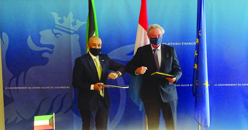 LUXEMBOURG: Kuwait’s ambassador Jasem Al-Budaiwi (left) and foreign minister of Luxembourg Jean Asselborn after signing the aviation agreement. —KUNA