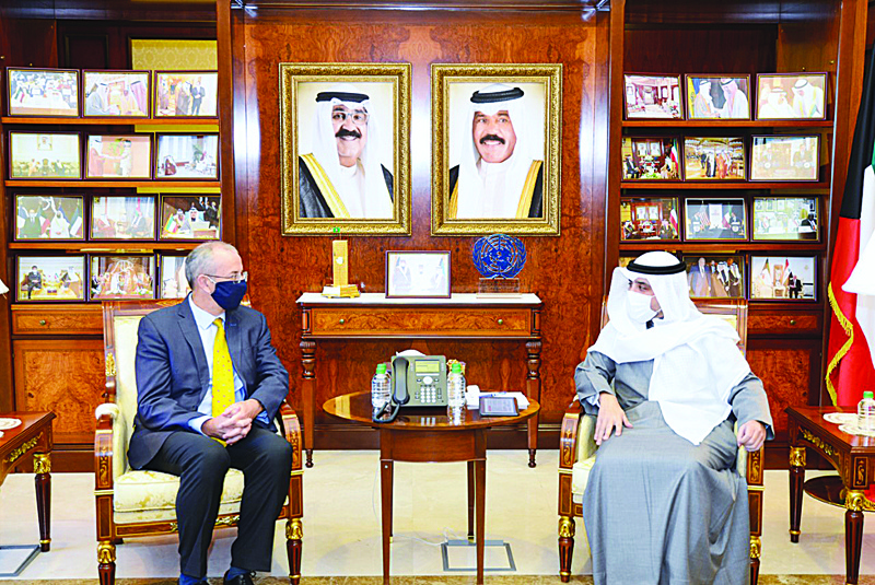 KUWAIT: Foreign Minister and Minister of Cabinet Affairs Sheikh Dr Ahmad Nasser Al-Mohammad Al-Sabah meets British Ambassador to Kuwait Michael Davenport. - KUNAn