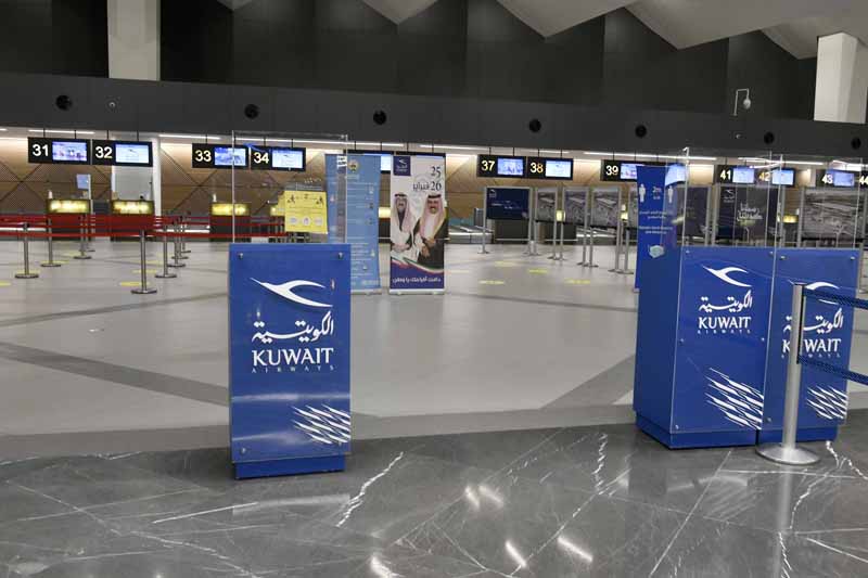 KUWAIT: This March 14, 2021 file photo shows empty counters at Terminal 4 of Kuwait International Airport. – KUNAn