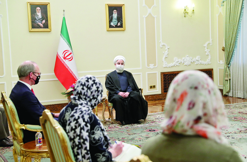 TEHRAN: A handout picture provided by the Iranian presidency yesterday shows Iran's President Hassan Rouhani (right) receiving Irish Minister for Foreign Affairs Simon Coveney in the capital Tehran. - AFPn