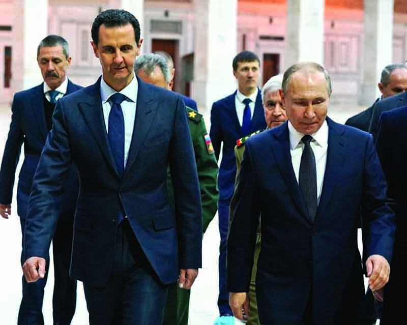DAMASCUS: In this file picture, Syrian President Bashar Al-Assad (left) visiting the historic Ummayad Mosque with Russian President Vladimir Putin (right) in old Damascus. A decade of war may have ravaged his country, but Assad has clung to power and looks determined to cement his position in presidential elections this year. --AFPn