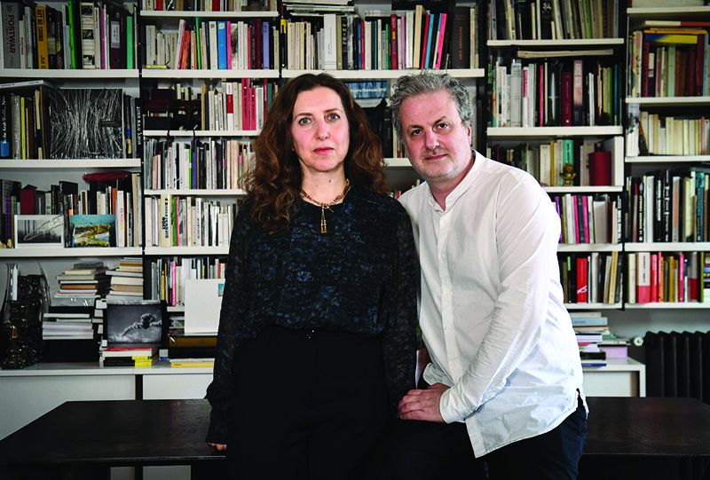 Lebanese film directors Joana Hadjithomas and Khalil Joreige pose in Paris. - AFPn