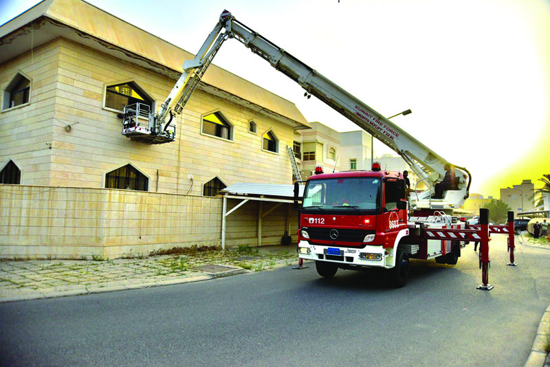 A fire engine is seen outside a Faiha house where a fire was reported yesterday. n