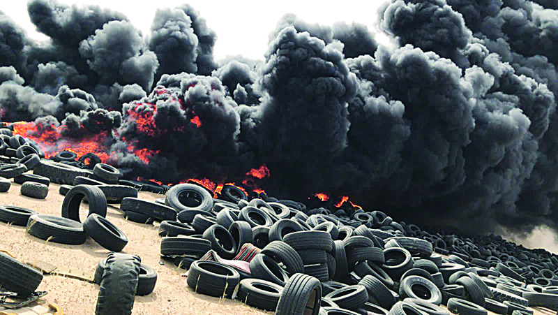 KUWAIT: A fire guts tires in a dump in Salmi yesterday.