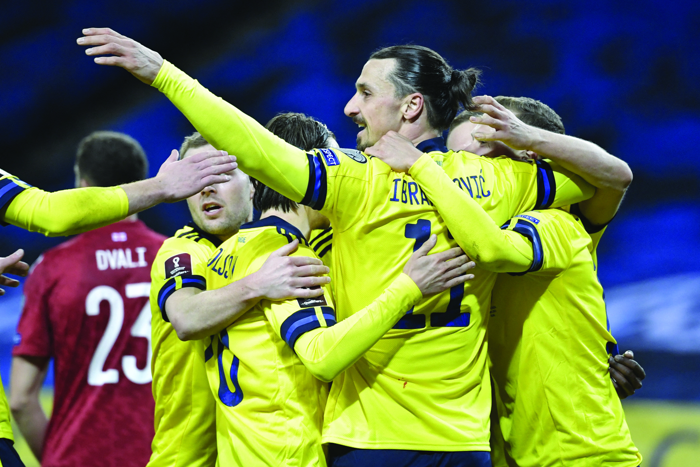 SOLNA: Sweden’s forward Zlatan Ibrahimovic (center) and his teammates celebrate the first goal during the FIFA World Cup Qatar 2022 qualification football match Sweden v Georgia in Solna, near Stockholm on Thursday. — AFP