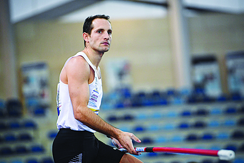 MIRAMAS: In this file photo taken on February 21, 2021, France's Renaud Lavillenie looks on as he competes in the men pole vault final during the Athletics French Indoor Championships at the Stadium Miramas Metropole, in Miramas.  - AFn