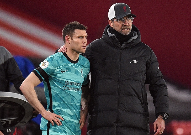 SHEFFIELD: Liverpool's German manager Jurgen Klopp brings on Liverpool's English midfielder James Milner during the English Premier League football match between Sheffield United and Liverpool at Bramall Lane in Sheffield, northern England on Sunday. – AFPn