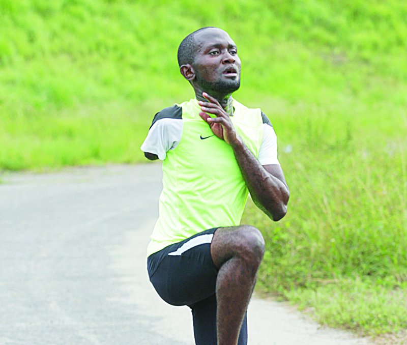 LIBREVILLE: Gabonese paralympic athlete Davy Moukagni trains for the 100m at the Owendo Technical High School in Libreville on February 5, 2021, in preparation for the Tokyo Paralympic Games scheduled for late August 2021. - AFPn