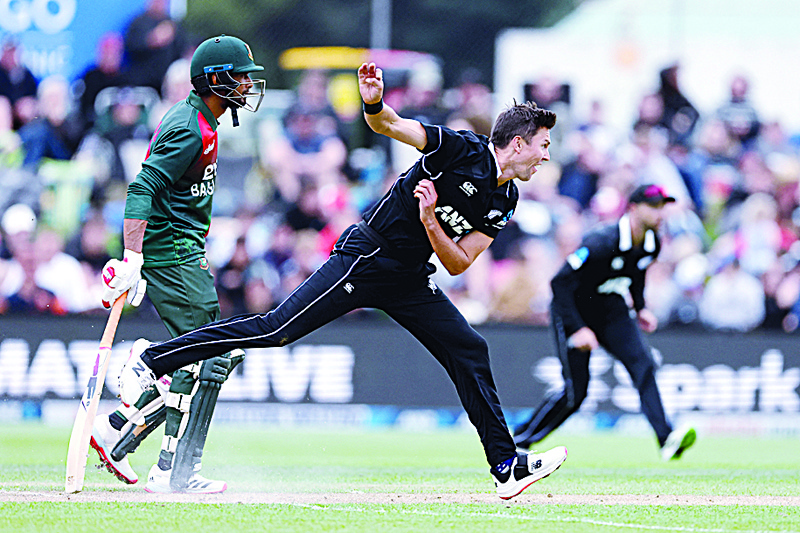 DUNEDIN: New Zealand's Trent Boult bowls past Bangladesh's Taskin Ahmed (back) during the 1st cricket ODI match between New Zealand and Bangladesh at University Oval in Dunedin yesterday. - AFPn