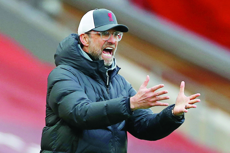 LIVERPOOL: Liverpool's German manager Jurgen Klopp gestures on the touchline during the English Premier League football match between Liverpool and Fulham at Anfield in Liverpool, north west England on March 7, 2021. - AFPn