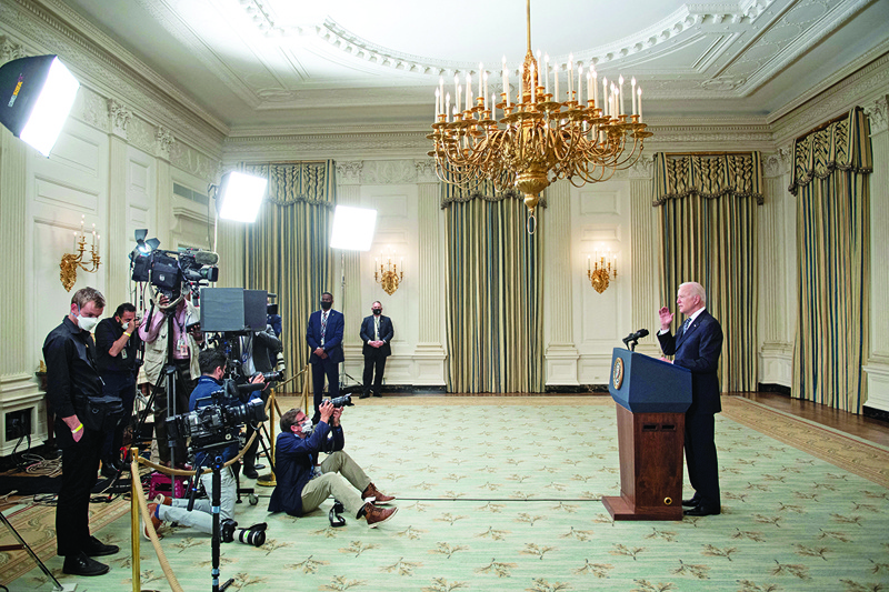 WASHINGTON: US President Joe Biden delivers remarks on a vaccination update from the State Dining Room at The White House on Tuesday. - AFPn