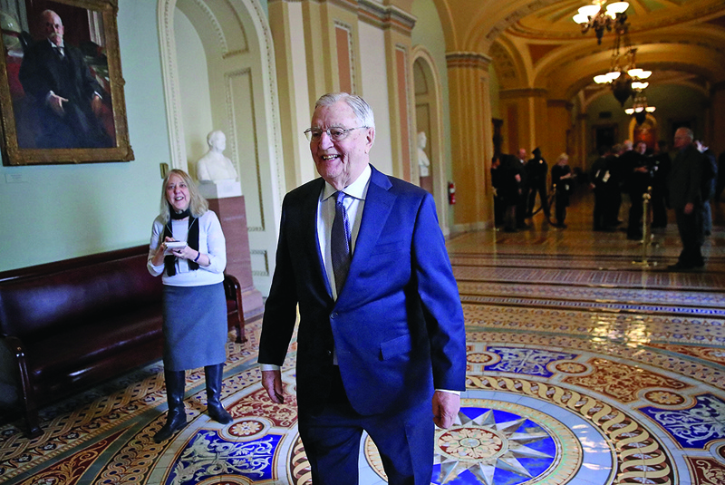 In this file photo, former US Vice President Walter Mondale walks outside the US Senate chamber in the US Capitol January 3, 2018 in Washington, DC. - AFPn