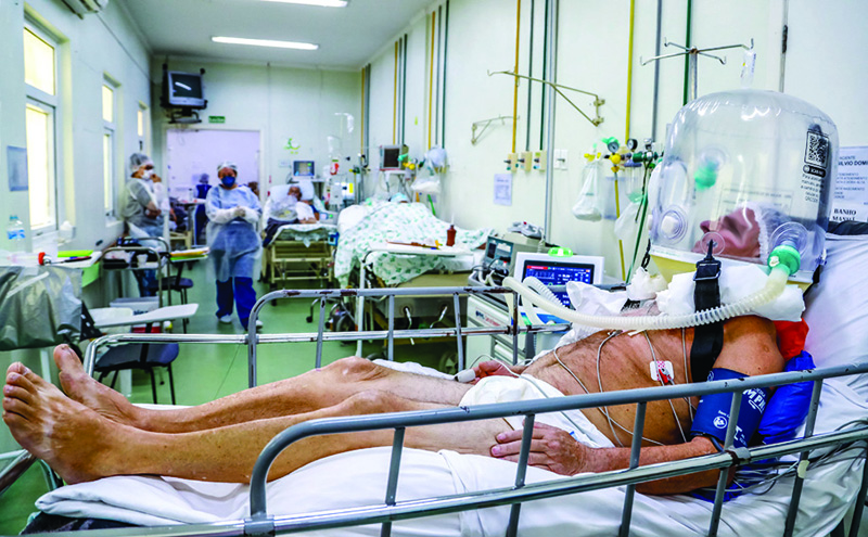 A patient uses a new non-invasive technology that can reduce the need of intubation at the COVID-19 area of the Centenario Hospital in Sao Leopoldo, Rio Grande do Sul state, southern Brazil Friday. —AFP