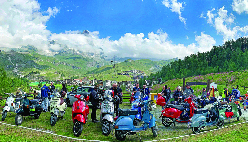Vespa scooters are pictured in Cervinia, Italian Alps. -AFP photosn