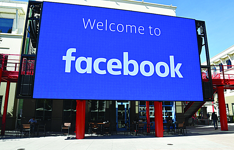 MENLO PARK, California: In this file photo taken on Oct 23, 2019 a giant digital sign is seen at Facebook's corporate headquarters campus. - AFP n