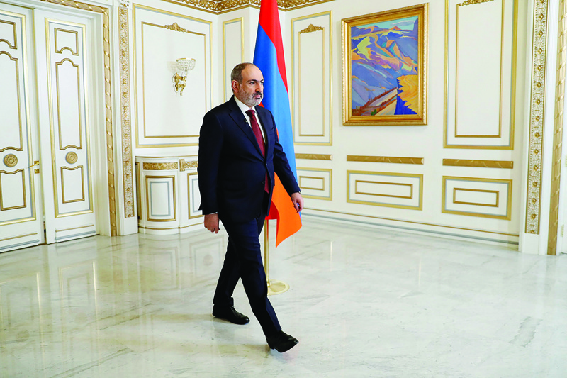 YEREVAN: Armenian Prime Minister Nikol Pashinyan arrives to address the nation in Yerevan. Pashinyan announced yesterday his resignation while retaining interim duties formalizing a parliamentary vote to be held June 20.-AFPn