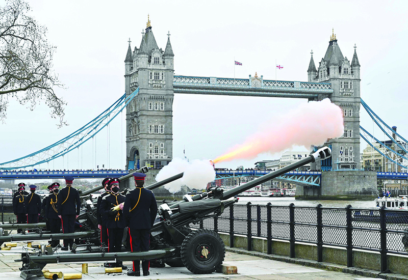 LONDON: The Death Gun Salute is fired by the Honorable Artillery Company to mark the passing of Britain's Prince Philip, Duke of Edinburgh (inset), at the Tower of London yesterday, a day after his death at the age of 99. - AFP n