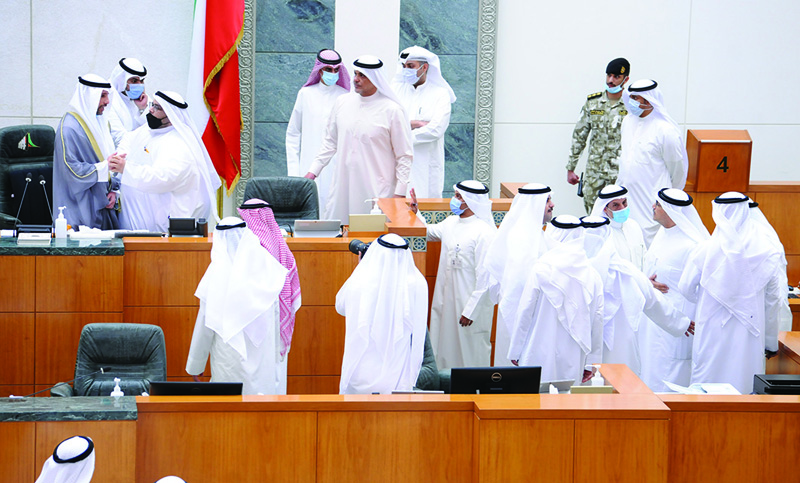 KUWAIT: MPs engage in heated arguments during the National Assembly session yesterday.-Photo by Yasser Al-Zayyat n