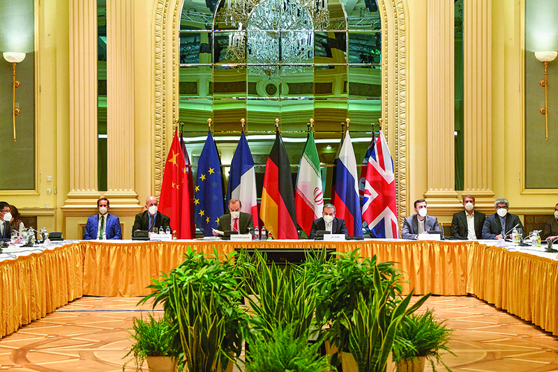 VIENNA: Delegation members from the parties to the Iran nuclear deal - Germany, France, Britain, China, Russia and Iran - attending a meeting at the Grand Hotel of Vienna yesterday as they try to restore the deal. -- AFPn