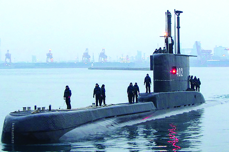 DENPASAR, Bali: The Indonesian Cakra class submarine KRI Nanggala 402 docking at the naval base in Surabaya. Indonesia's military said it was searching for the submarine with 53 crew aboard after losing contact with the vessel during naval exercises off the coast of Bali yesterday.-AFPn