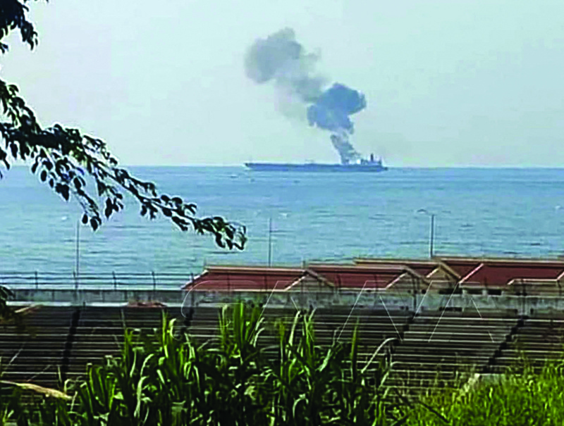 Smoke billowing from a tanker off the coast of the western Syrian city of Baniyas. An Iranian tanker was attacked off the Syrian coast, sparking a fire, the Britain-based Syrian Observatory for Human Rights said.-AFPn