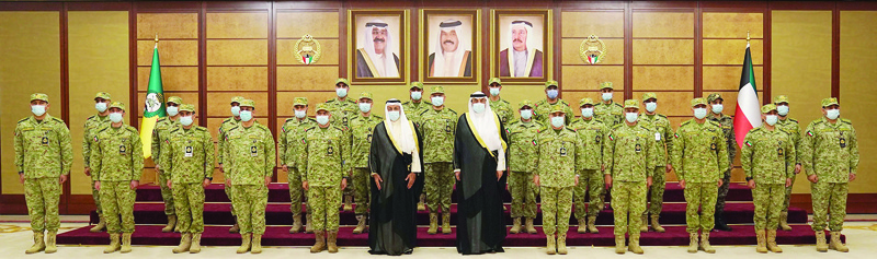 KUWAIT: His Highness the Prime Minister Sheikh Sabah Al-Khaled Al-Hamad Al-Sabah in a group photo during his visit to the General Command of the Kuwait National Guard. - KUNA photosn