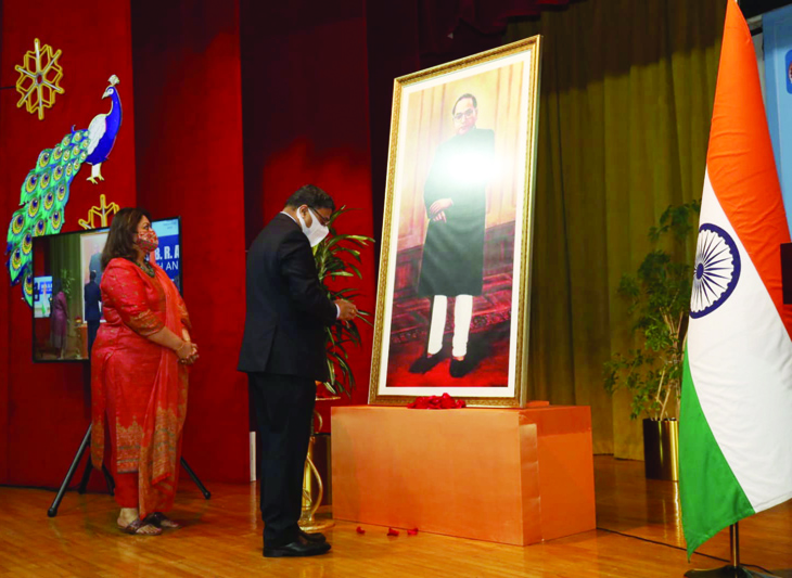 KUWAIT: Indian Ambassador to Kuwait Sibi George pays a floral tribute to a life-size portrait of Dr B R Ambedkar, the architect of the Indian constitution. n